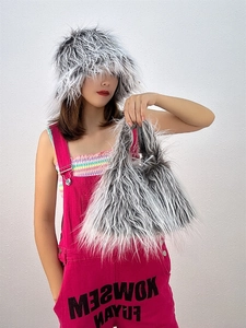 Faux sheepskin plush hat and matching fuzzy handbag set in black and white pattern