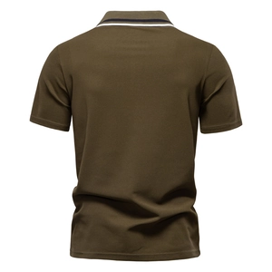 Rear view of deep olive green polo shirt featuring contrast striped rib knit collar detail
