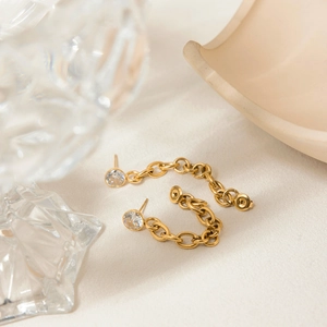 Minimalist gold tassel earrings with round zircon stones and oval link chain drops