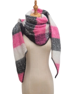 Detail of pink and black plaid woven shawl with professional edge stitching on mannequin