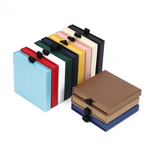 Multi-color square drawer jewelry boxes with black ribbon pulls in various vibrant colors