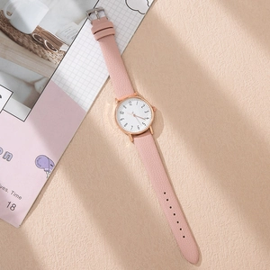 Pink faux leather women's quartz watch with rose gold case and Arabic numerals