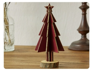 Detail of burgundy mini wooden Christmas tree with gold glitter edges and wood base