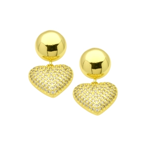 Close-up of gold heart earrings with sparkling pavé cubic zirconia on white background