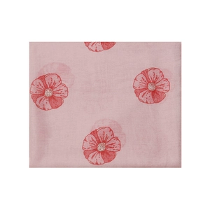 Close-up of pink floral scarf fabric showing detailed red flower print and fiber texture