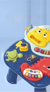Detail of baby activity table featuring music piano keys and colorful ocean-themed toys