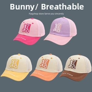 Detail of five kids' mesh baseball caps featuring cartoon rabbit embroidery and text