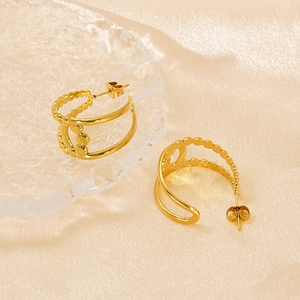Vintage 18K gold plated double-layered C-shaped chain earrings on silk fabric
