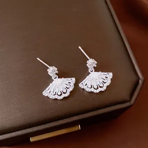 S925 silver fan-shaped stud earrings with micro-paved zircons on leather jewelry box