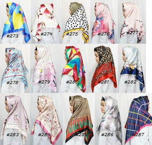 Collage of 15 Bohemian paisley silk scarves showing diverse patterns and colors for women