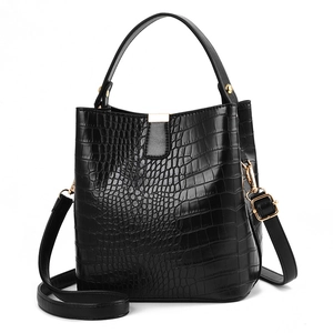 Fashionable black crocodile pattern bucket bag with gold hardware and top handle strap