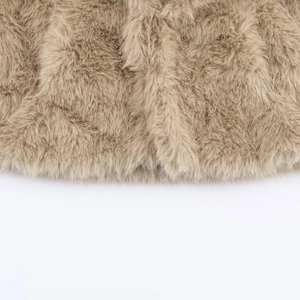 Short faux fur jacket in khaki, detailed texture of the fluffy and soft fabric