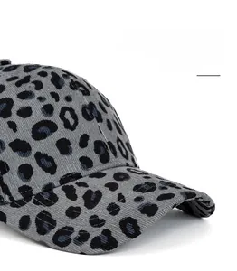 Detail of leopard print corduroy texture and wide brim of this stylish baseball cap