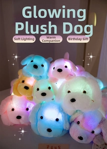 Close-up of colorful glowing plush puppies with soft LED lights in a dark setting