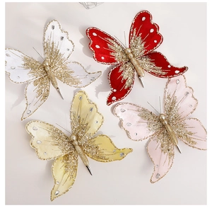 Flat lay of colorful sequined butterfly ornaments for Christmas tree decoration