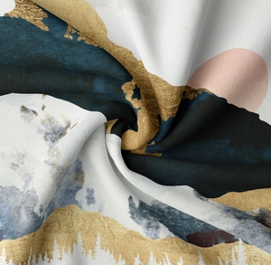 Close-up of soft mountain tapestry fabric showing fine weaving and artistic print details