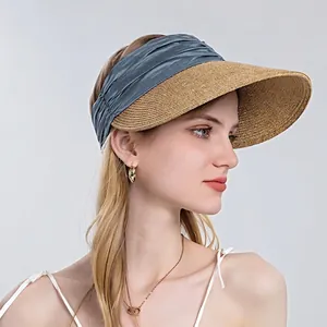Women's woven open top straw sun hat with blue pleated headband for beach vacation