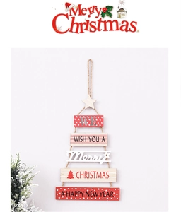 Detail of wooden Christmas tree wall hanging with five tiers and rustic star top