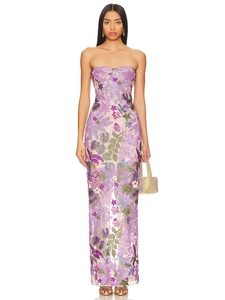 Detailed close-up of intricate floral embroidery and sequins on a purple strapless dress