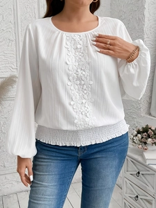 Elegant white long sleeve round neck shirt with floral lace and smocked waist hem