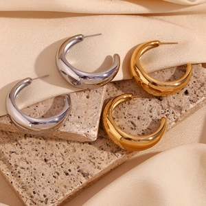Chunky C-shaped polished stainless steel hoop earrings in gold and silver finish