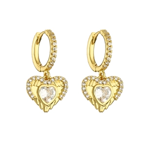 Detail of golden heart dangle hoop earrings with crystal pavé and wing relief texture