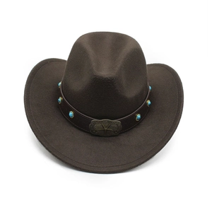 Close-up of brown wool western cowboy hat with leather band and turquoise star detail