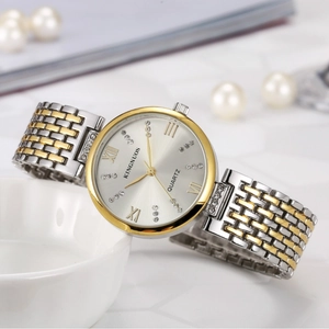 Silver dial ladies watch with two-tone steel strap and diamond accents in elegant setting