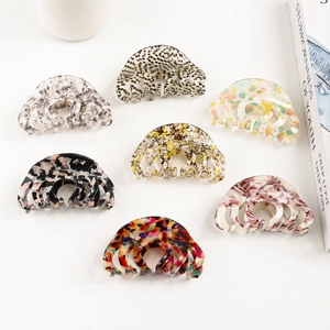 French vintage acetate hair claws set in various tortoiseshell patterns for thick hair