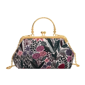 Elegant Chinese style handbag with floral embroidery and golden metal chain strap