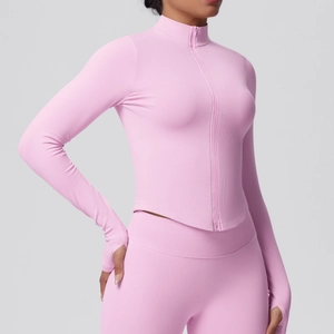 Pink slim-fit yoga set featuring a stand-collar zip-up jacket with thumbholes and leggings