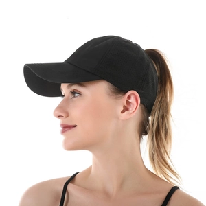 Side view of black mesh ponytail baseball cap showing hair opening and breathable fabric
