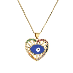 Golden heart necklace featuring a blue evil eye pendant with sparkling colorful zircon stones