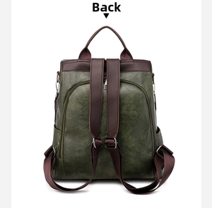 Rear view of dark green PU leather anti-theft backpack with hidden zipper and brown straps