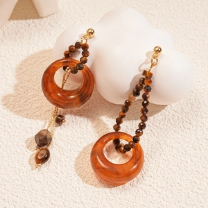 Asymmetric resin tiger eye earrings with golden tassels in vintage bohemian style