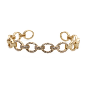 Golden chain bracelet featuring micro-pave white zircon stones in a geometric design