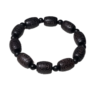 Ebony wood prayer bracelet featuring carved auspicious cloud cylinder beads in retro style