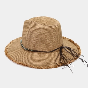 Classic straw Panama hat with colorful beads and long tassels for beach sun protection