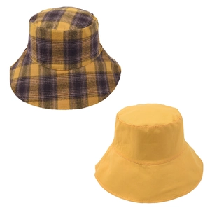Double-sided bucket hat featuring yellow plaid pattern and solid yellow finish