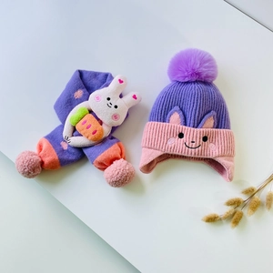 Kids knitted beanie and scarf set with purple pompom and 3D bunny decor for winter warmth