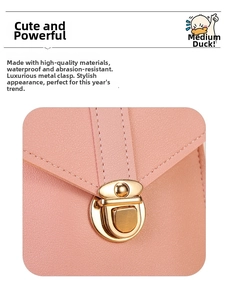 Close-up of pink leather phone bag with litchi texture and golden metal snap button