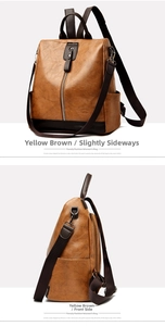 Detail view of the brown PU leather backpack showing side pockets and stitching