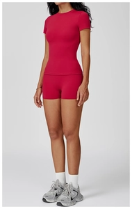 Slim fit red yoga set with round neck top and high elastic sports shorts for running