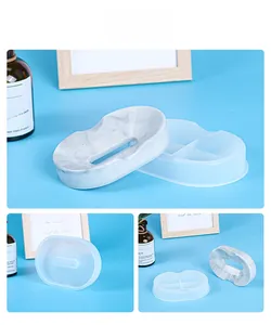 Detail view of transparent silicone soap dish mold and marble texture finished product