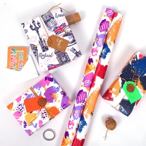 London themed wrapping paper rolls with matching tags and twine for DIY gift packaging