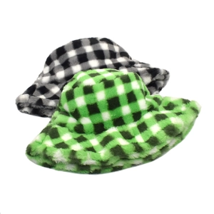 Detail view of checkerboard pattern faux fur bucket hats in black and green colors