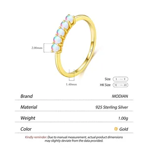 Elegant 925 sterling silver gold ring with five round iridescent moonstones in minimalist style