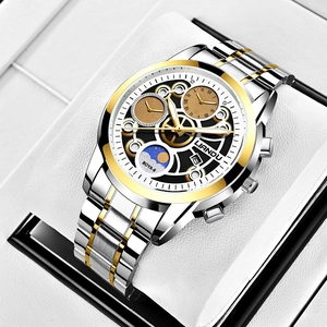 Close-up of LIANDU gold and silver skeleton watch with moon phase on white pillow