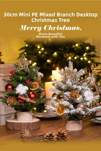 Detailed view of 30cm mini Christmas trees with warm lights and festive decorations