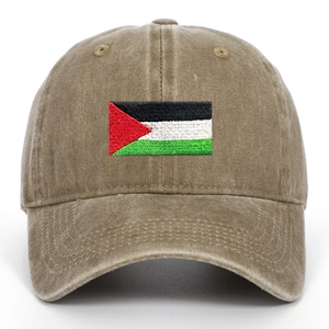Close-up of vintage washed khaki cotton baseball cap with embroidered flag details